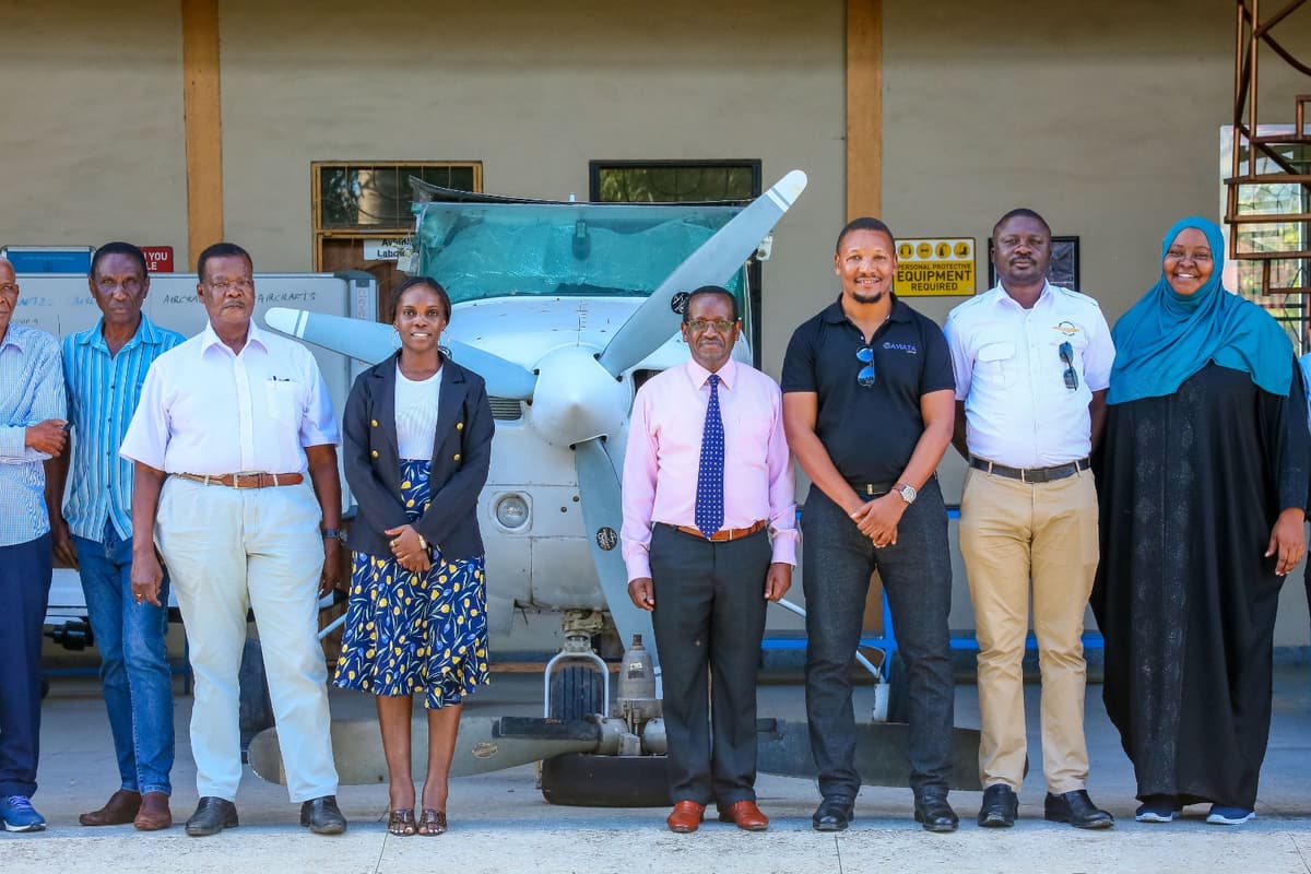 Harmonics Air Centre Team with Training Aircraft