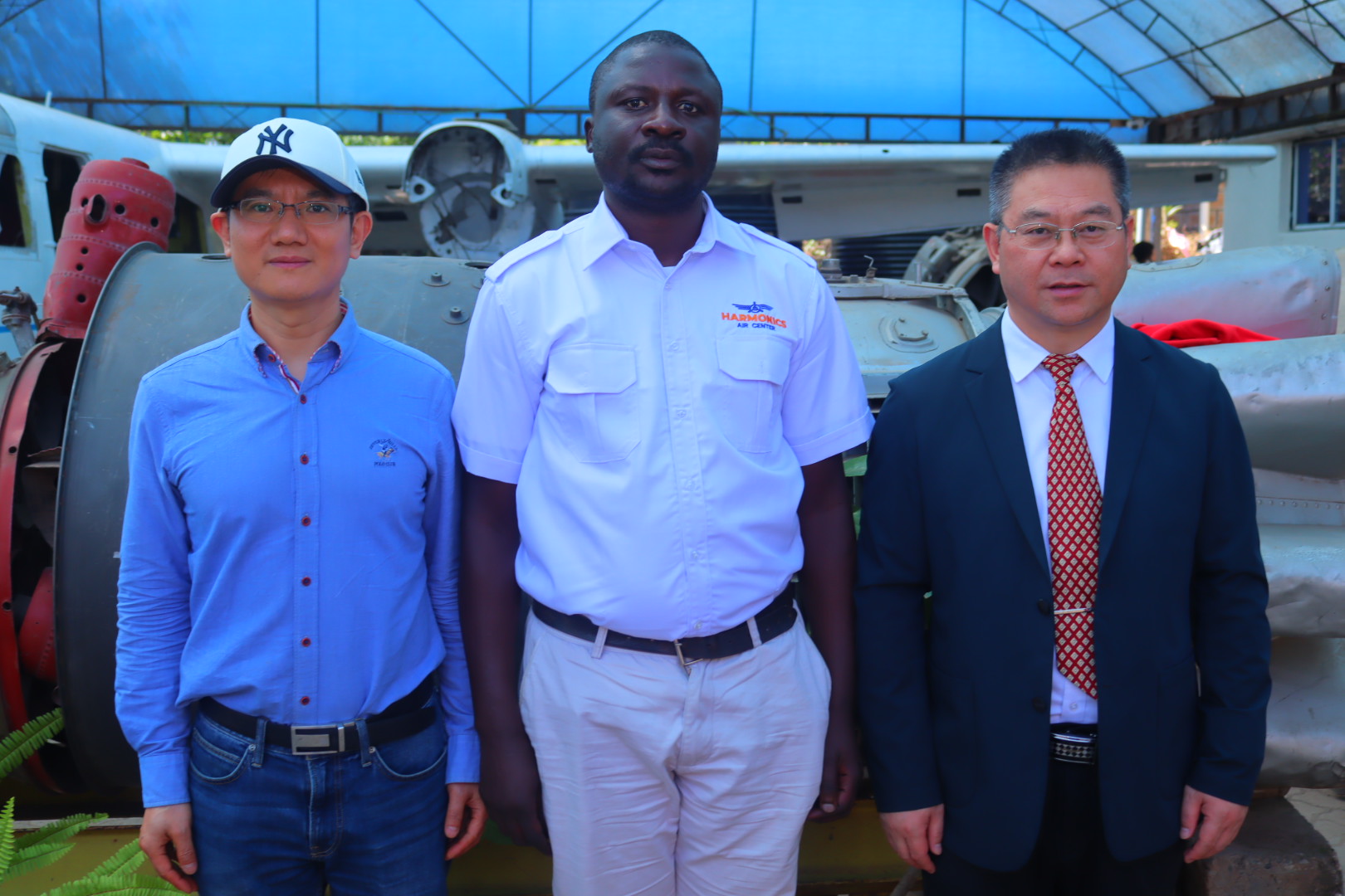 NUAA Dean and Deputy Dean with Harmonics CEO at partnership signing