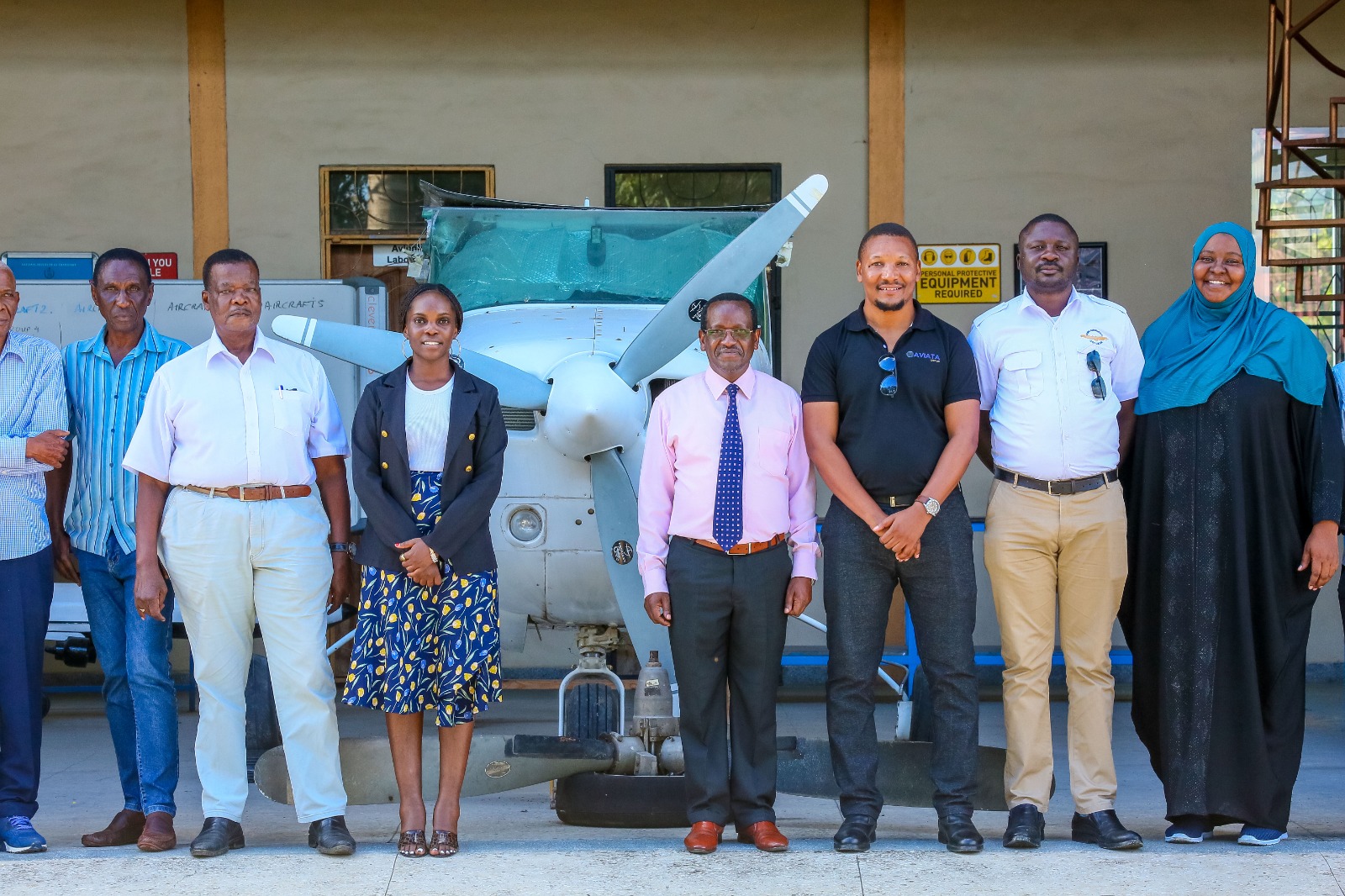 Harmonics Air Centre Team with Training Aircraft